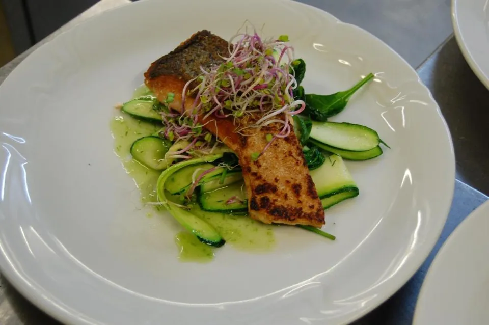Salmon on a courgette and spinach nest
